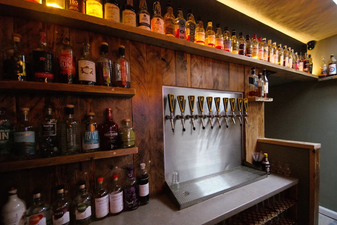 Our impressive bar setup featuring 10 rotating craft beer taps with a variety of local and international brews